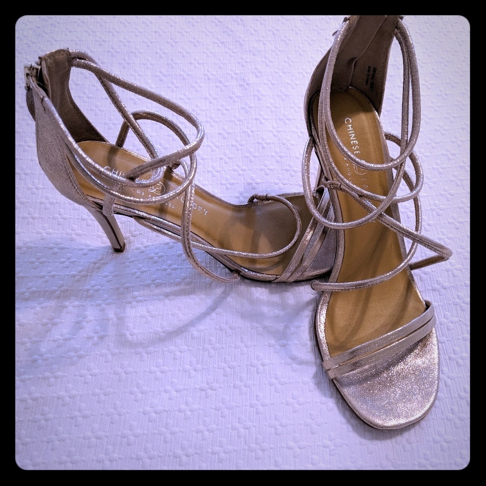 Gold glittery strappy heels